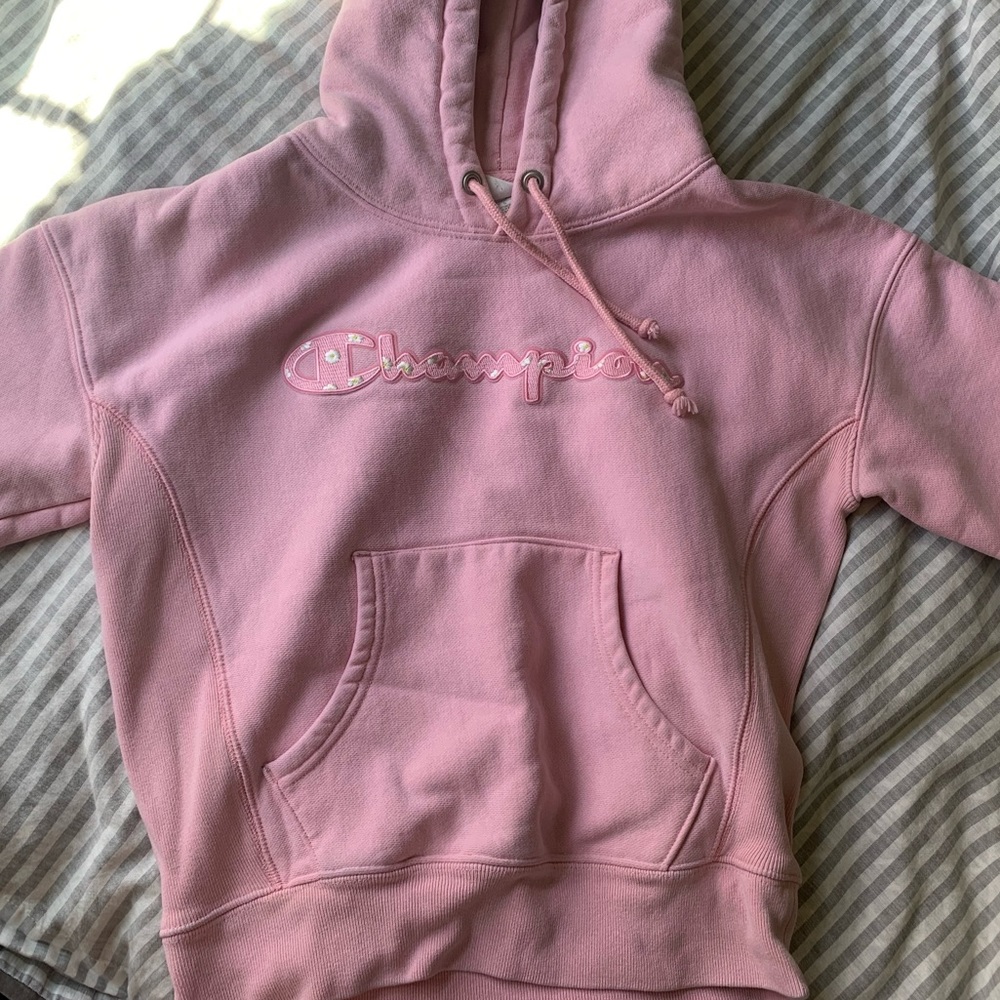 pink daisy logo reverse weave champion hoodie
